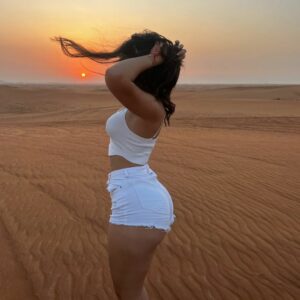 Ameli Olivera radiates beauty under the captivating sunset, her alluring curves effortlessly stealing the spotlight. Ameli Olivera radiates beauty under the captivating sunset, her alluring curves effortlessly stealing the spotlight.
