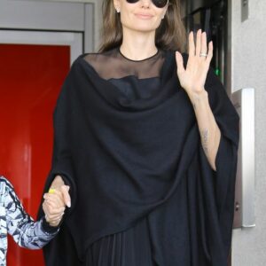 Angelina Jolie stuns in effortless elegance at LAX. Her airport style is always on point! Angelina Jolie stuns in effortless elegance at LAX. Her airport style is always on point!