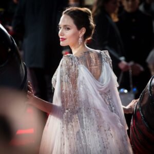 Angelina Jolie stuns as a reallife enchantress in a mesmerizing white gown at the Maleficent London premiere. Pure magic on the red carpet! Angelina Jolie stuns as a reallife enchantress in a mesmerizing white gown at the Maleficent London premiere. Pure magic on the red carpet!