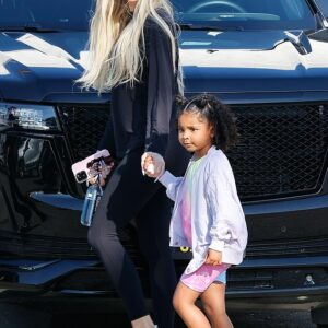 Khloe Kardashian proves that effortless style runs in the family, effortlessly chic in sleek leggings while soaking up the LA sun with baby True. Khloe Kardashian proves that effortless style runs in the family, effortlessly chic in sleek leggings while soaking up the LA sun with baby True.