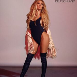 Khloe Kardashian is turning heads in this sleek black bodysuit, showcasing her enviable figure with confidence and grace. Khloe Kardashian is turning heads in this sleek black bodysuit, showcasing her enviable figure with confidence and grace.