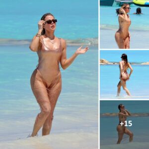 Stealing the spotlight in a barelythere thong swimsuit, Khloe Kardashian embraces her curves confidently and unapologetically. Stealing the spotlight in a barelythere thong swimsuit, Khloe Kardashian embraces her curves confidently and unapologetically.