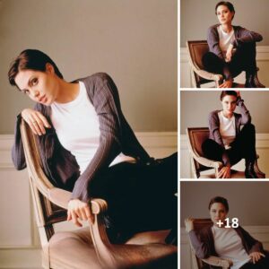 Transport yourself to 1997 and witness the timeless elegance of Angelina Jolie captured beautifully by Amy Etra. A true vision from the past! Transport yourself to 1997 and witness the timeless elegance of Angelina Jolie captured beautifully by Amy Etra. A true vision from the past!