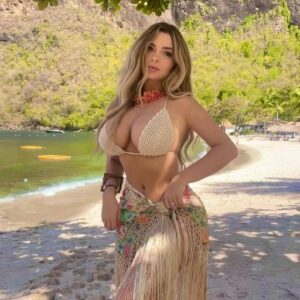 Demi Rose Flaunts Her Toned Figure in Hawaiian-Inspired Swimwear During Her Caribbean Getaway @followers